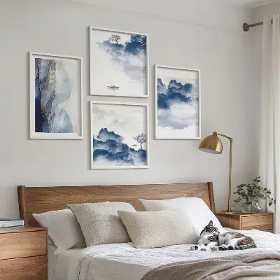 Multi-piece wall art set featuring mountains, clouds, trees, and birds