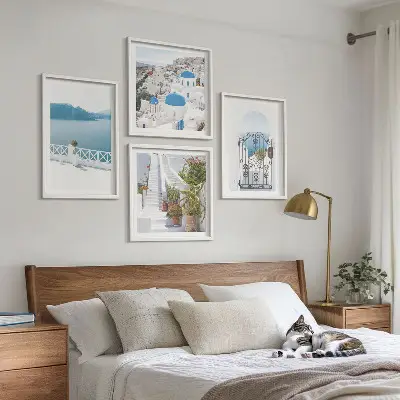 Set of 4 wall art pieces featuring white stairs, plants, and the sea