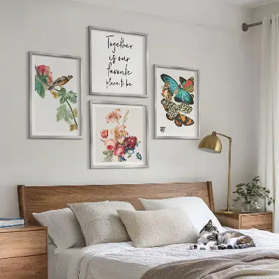 Set of 4 wall art pieces featuring flowers, butterflies, and birds in pastel colors