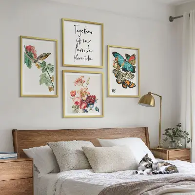 Set of 4 wall art pieces featuring flowers, butterflies, and birds in pastel colors