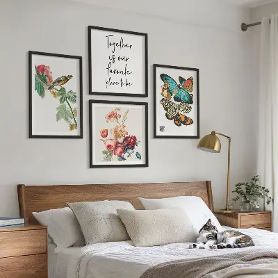 Set of 4 wall art pieces featuring flowers, butterflies, and birds in pastel colors