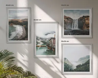 Multi-piece wall art set featuring a mountain, beach, and cloud landscape
