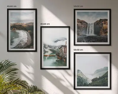 Multi-piece wall art set featuring a mountain, beach, and cloud landscape