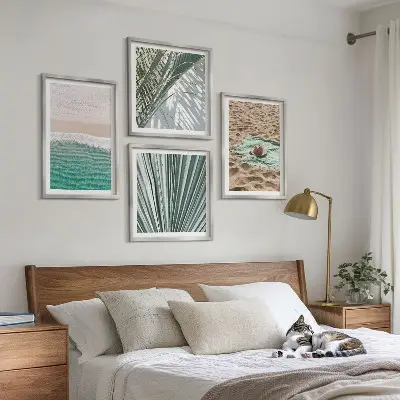 Set of 4 wall art pieces featuring holiday beach and sea views