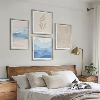 Set of 4 wall art pieces with beige and blue leaves and waves design