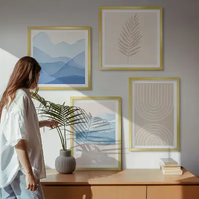 Set of 4 wall art pieces with beige and blue leaves and waves design