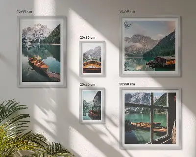 Framed landscape photo set featuring lakes, mountains, and boats