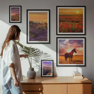 Gallery wall featuring landscape scenes of nature, horses, and flowers