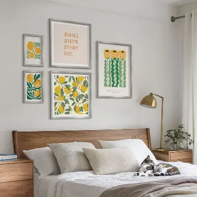Set of 5 wall art pieces featuring flowers, citrus, and positive slogans