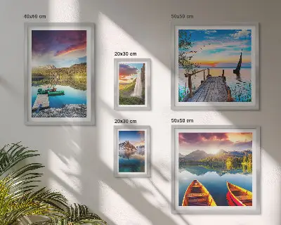 Gallery wall featuring landscape scenes of waterfalls and lakes