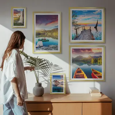 Gallery wall featuring landscape scenes of waterfalls and lakes