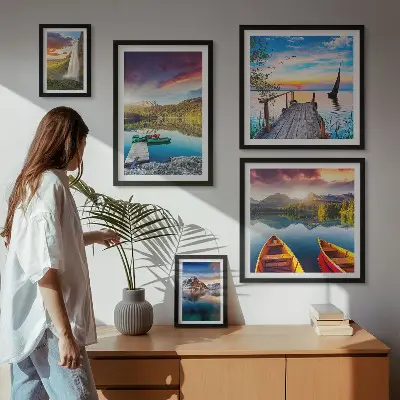 Gallery wall featuring landscape scenes of waterfalls and lakes