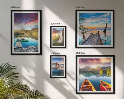 Gallery wall featuring landscape scenes of waterfalls and lakes