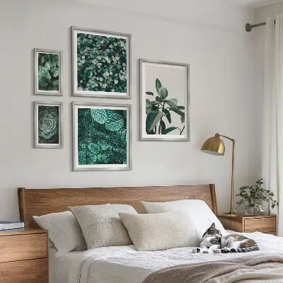 Framed photo set with green plant motif prints