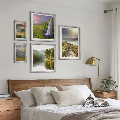 Gallery wall landscape prints of waterfalls and mountains