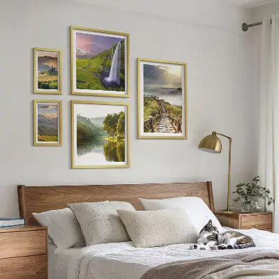 Gallery wall landscape prints of waterfalls and mountains