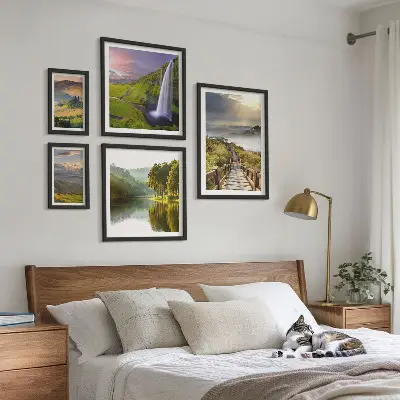 Gallery wall landscape prints of waterfalls and mountains