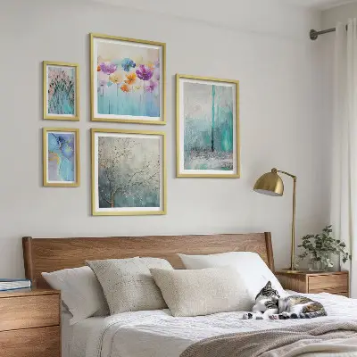 Gallery wall abstract landscapes and flowers