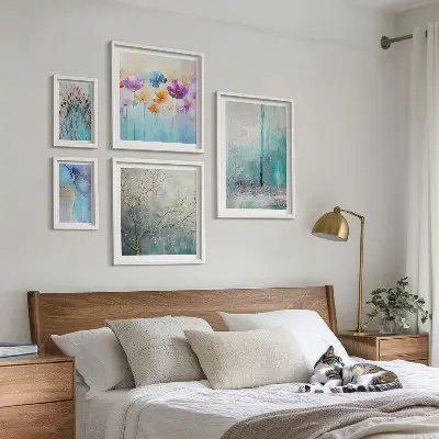 Gallery wall abstract landscapes and flowers