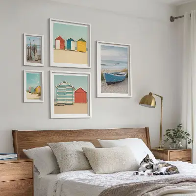 Framed photo set seaside views with houses and boats