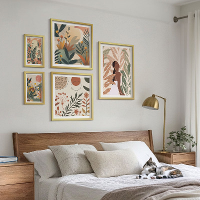 Gallery wall Boho style with a plant figure