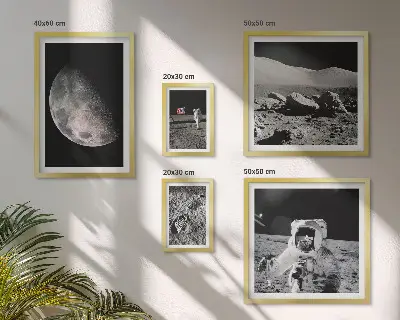 Gallery wall set astronaut-themed lunar landscapes