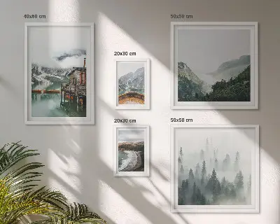 Framed photo set mountain landscapes, houses, and water