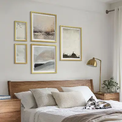 Framed photo set featuring birds, rocks, and brush stroke decorations