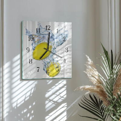 Glass clock square Lemons in water